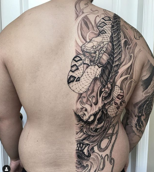 Brotherhood tattoo studio - Added the whole top half of this back piece to  some work i did around 8 years ago. All new work freehand. Part healed part  new. Thanks for
